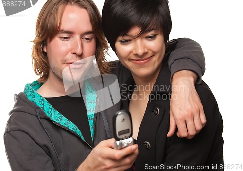 Image of Diverse Couple Using Cell Phone