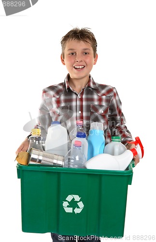 Image of Happy boy carrying rubbish for recycling