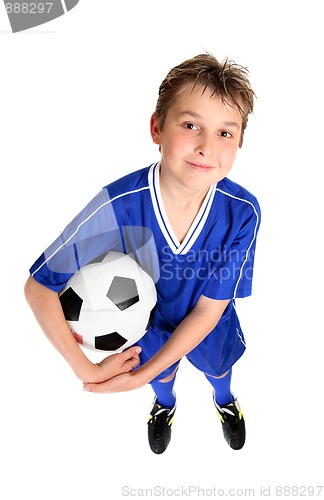 Image of Boy holding a soccer ball