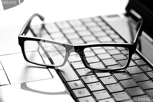 Image of glasses on laptop