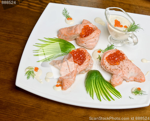 Image of roasted salmon filet with red caviar