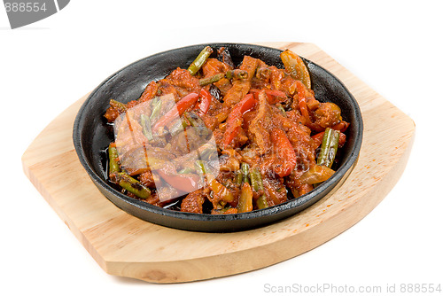 Image of meat and vegetables at pan