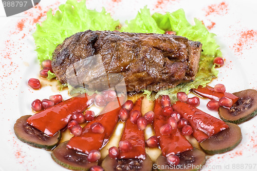 Image of beef steak with pomegranate