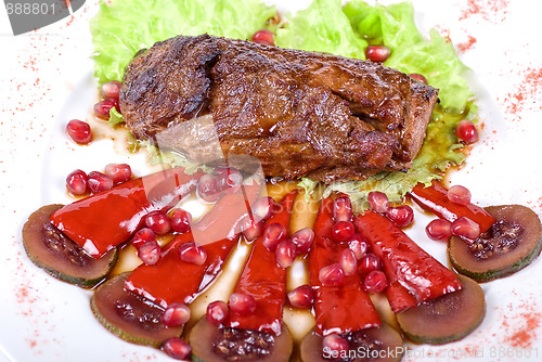 Image of beef steak with pomegranate