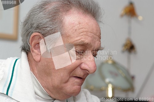 Image of Head of elderly man with thoughtful expression 