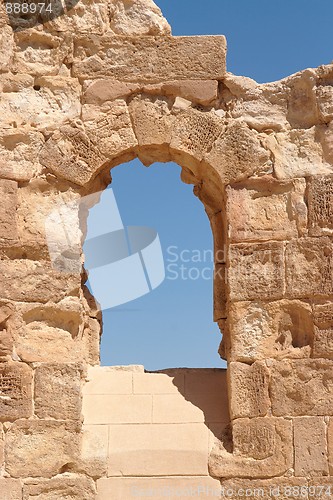Image of Ancient stone arched window