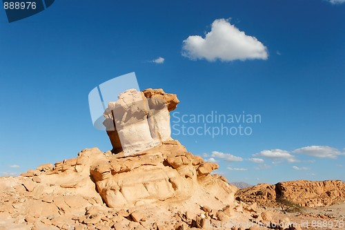 Image of Scenic orange rock in shape of mushroom in stone desert