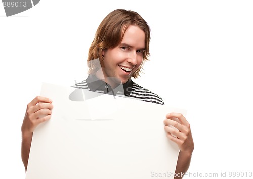 Image of Smiling Young Man Holding Blank White Sign