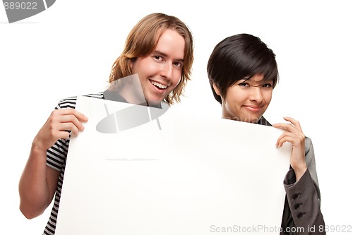 Image of Attractive Diverse Couple Holding Blank White Sign