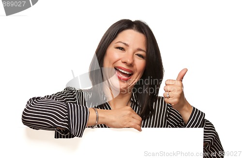 Image of Multiethnic Woman Leaning on Blank White Sign with Thumbs Up