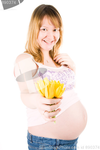 Image of pregnant woman with yellow tulips 