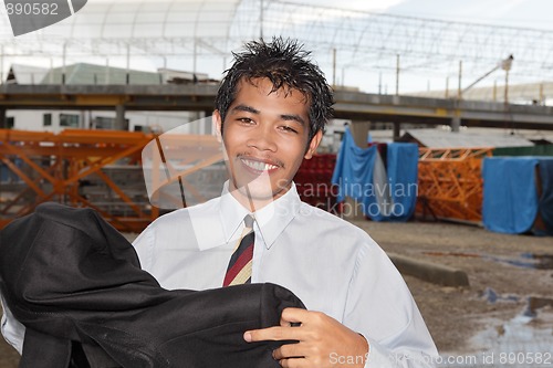 Image of Confident professional on construction site