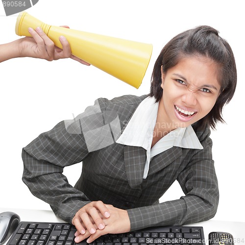 Image of Office worker getting loud instructions