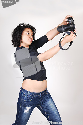 Image of Young girl with camera.