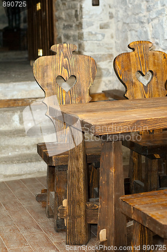 Image of Wooden table and chairs