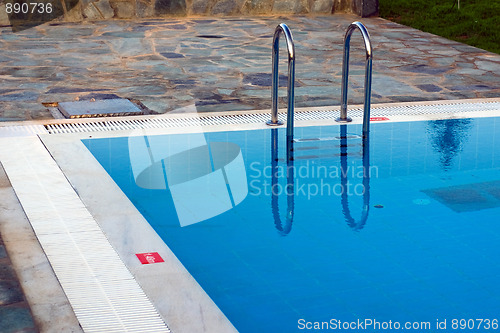 Image of Reflection of ladder in water