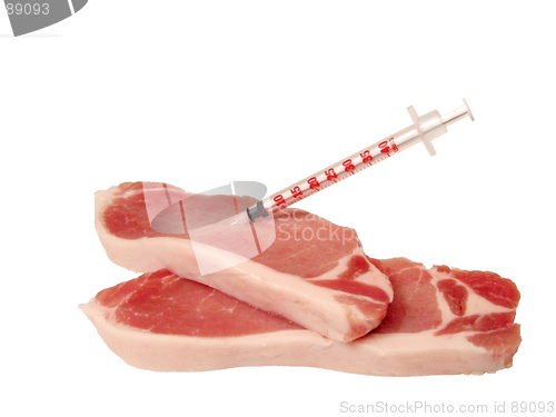 Image of Siringue in a pork meat piece
