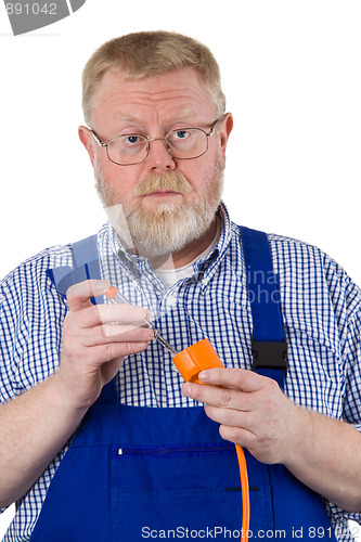 Image of Electrician with circuit tester