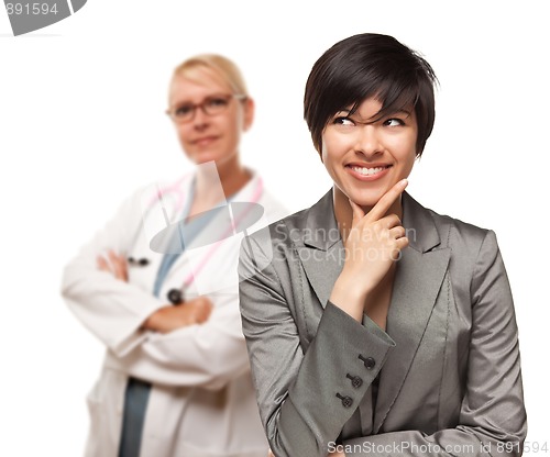 Image of Young Multiethnic Woman and Female Doctor