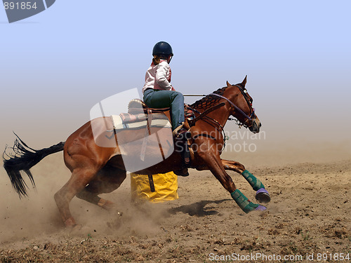 Image of Cowgirl Rounding a Drum in the Barrel Race 