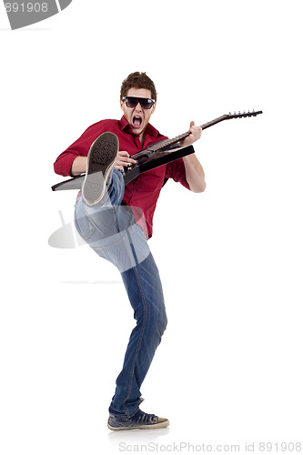 Image of kicking guitaris