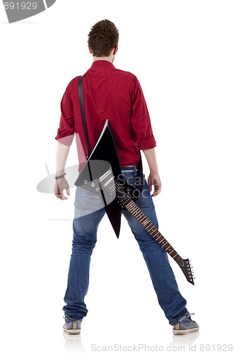 Image of guitar on back of a man