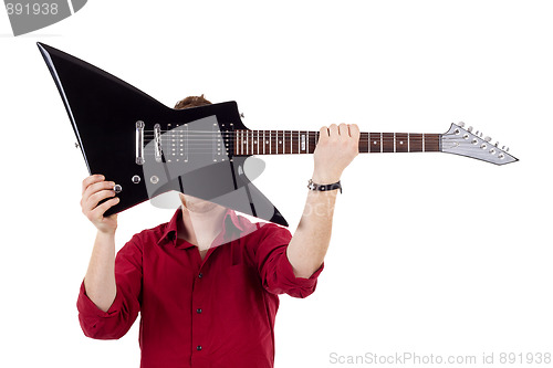 Image of guitar over face