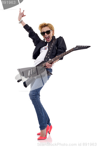 Image of energic blond guitarist
