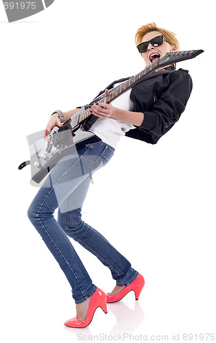 Image of passionate girl guitarist