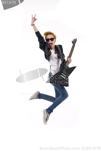 Image of woman guitarist jumps