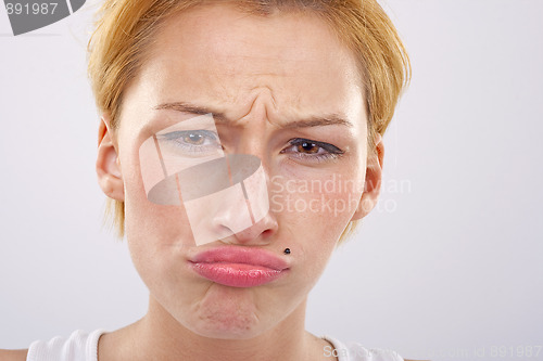 Image of  woman pulling a face