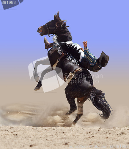 Image of Bucking Rodeo Horse with Rider