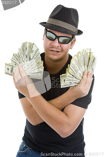 Image of man with lots of 100 dollar notes