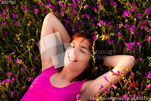 Image of Lying on flowers