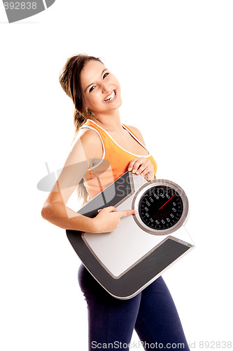 Image of Athletic girl with a scale