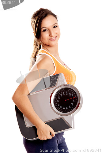 Image of Athletic girl with a scale