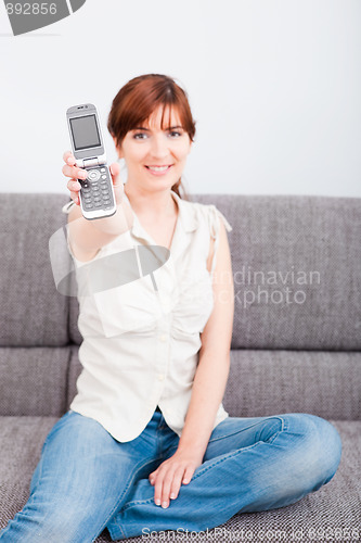 Image of Showing the cellphone