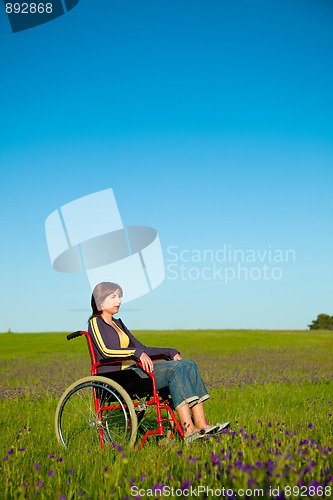 Image of Handicapped woman on wheelchair