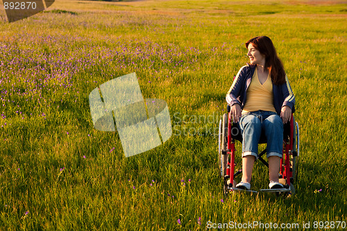 Image of Handicapped woman on wheelchair