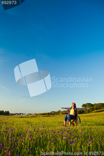 Image of Handicapped woman on wheelchair