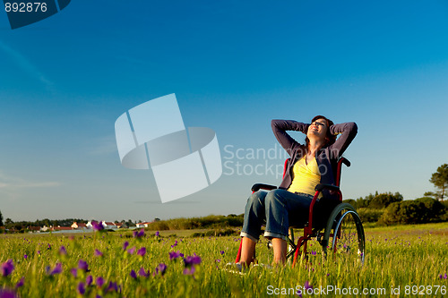 Image of Handicapped woman on wheelchair