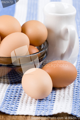 Image of eggs in a bowl and milk