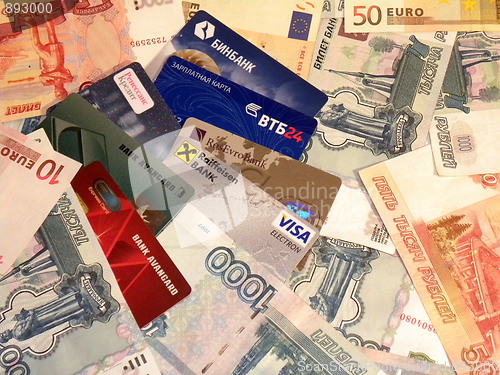 Image of Ready cash and credit cards of different countries