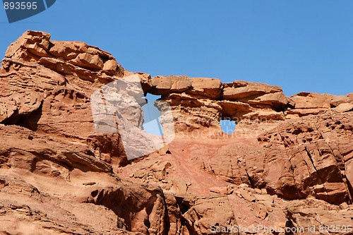 Image of Scenic weathered orange rock in stone desert