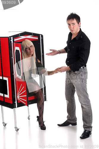 Image of Magician performance with beauty girls in a magic box