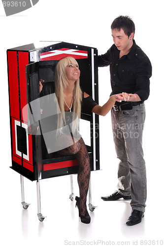 Image of Magician performance with beauty girls in a magic box