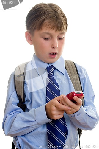 Image of School boy child sms texting