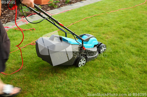 Image of Gardening - cutting the grass