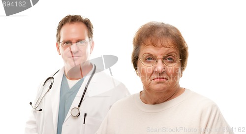 Image of Concerned Senior Woman with Doctor Behind
