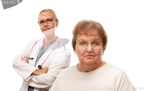 Image of Concerned Senior Woman with Doctor Behind
